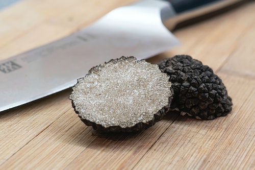 A black truffle cut in half.