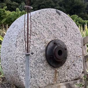 A stone wheel used to grind olives